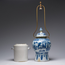 Five blue, white and polychrome Dutch Delft dishes, a lamp-mounted vase and a Brussels faience tobacco jar, 17th/19th C.