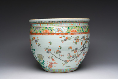A Chinese famille verte fish bowl with birds among blossoming branches, 19th C.