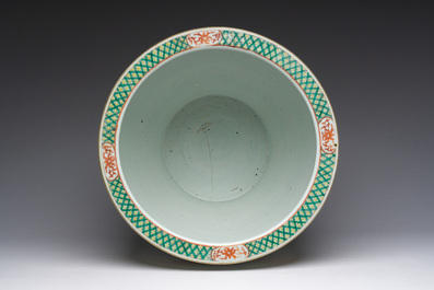 A Chinese famille verte fish bowl with birds among blossoming branches, 19th C.