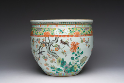 A Chinese famille verte fish bowl with birds among blossoming branches, 19th C.