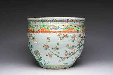 A Chinese famille verte fish bowl with birds among blossoming branches, 19th C.