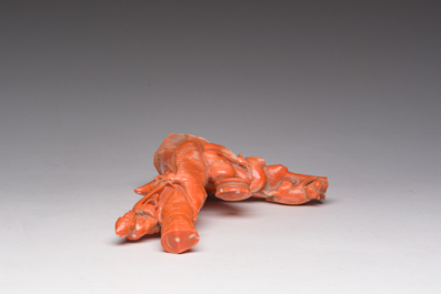 A Chinese red coral group with a scholar, his servant and a monkey, two-character mark, 19th C.