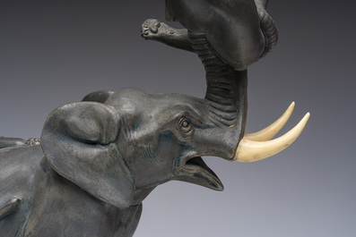 Illegibly signed: An elephant attacked by two tigers, zamak on a marble and onyx base, second quarter 20th C.