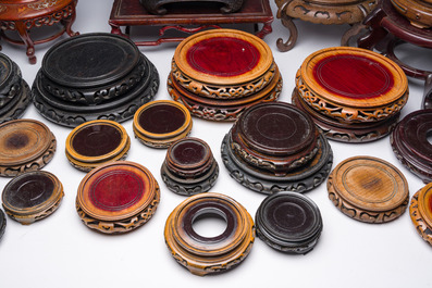 A collection of Chinese wooden stands, 20th C.