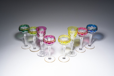 Eight partly coloured overlay cut crystal glasses, six of which with gilt design, Belgium, Val Saint Lambert, 20th C.