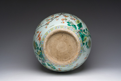 A Chinese famille verte fish bowl with birds among blossoming branches, 19th C.