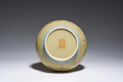 A Chinese famille rose enamelled teadust-glazed bottle vase with dragons, Qianlong mark, 19th C.