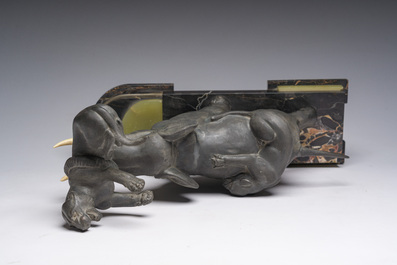 Illegibly signed: An elephant attacked by two tigers, zamak on a marble and onyx base, second quarter 20th C.