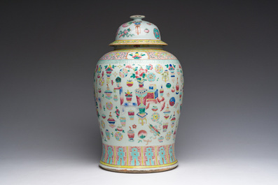 A Chinese famille rose 'antiquities' vase and cover, 19th C.