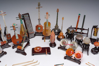 A Chinese collection of agate carved musical instruments with an accompanying presentation box, Republic, 20th C.