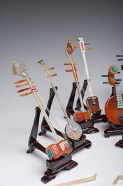 A Chinese collection of agate carved musical instruments with an accompanying presentation box, Republic, 20th C.
