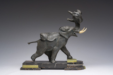 Illegibly signed: An elephant attacked by two tigers, zamak on a marble and onyx base, second quarter 20th C.