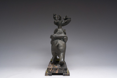 Illegibly signed: An elephant attacked by two tigers, zamak on a marble and onyx base, second quarter 20th C.