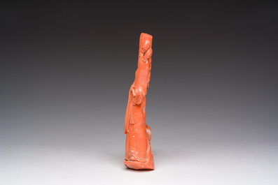 A Chinese red coral group with a scholar, his servant and a monkey, two-character mark, 19th C.