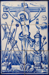 A blue and white Dutch Delft tile mural with Christ on the cross surrounded by the Instruments of the Passion, 19th/20th C.