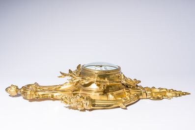 A French gilt bronze Louis XVI style cartel clock with floral design, late 19th C.