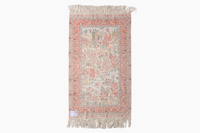 A Chinese silk Hereke style rug with birds in a landscape, 20th C.