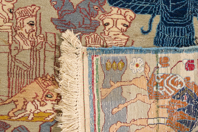 A Persian Qom (Qum/Ghom) silk rug with floral design and a Tabriz rug with animals, 20th C.