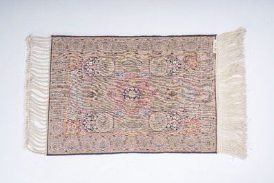 An extremely fine Chinese Hereke style silk rug with floral design, 20th C.