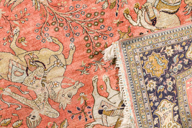 A Persian Qom (Qum/Ghom) silk rug with hunting scenes, 20th C.