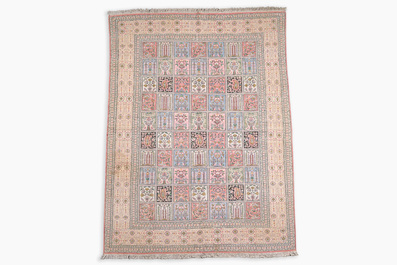 An Indian silk Kashmir rug with floral design, 20th C.