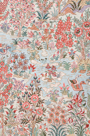 A Chinese silk Hereke style rug with birds in a landscape, 20th C.