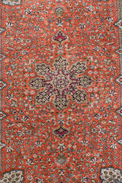 A Persian Qom (Qum/Ghom) silk rug and a Chinese silk Hereke style rug with floral design, 20th C.
