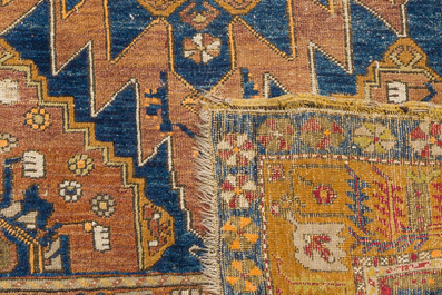 Two Turkish rugs, a.o. a Kilim, wool on cotton, mid 20th C.