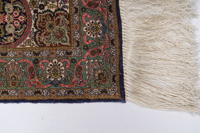 An extremely fine Chinese Hereke style silk rug with floral design, 20th C.