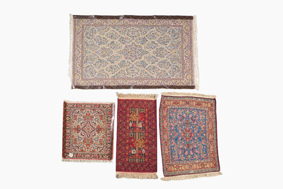 Four oriental rugs (Sarouk, Hamadan and an Afghan carpet), wool on cotton, 20th C.