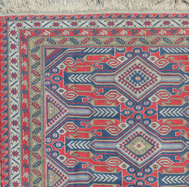 A Persian wool Saroukh rug with geometric floral design, third quarter 20th C.