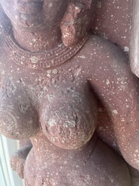 An Indian yellow-speckled red sandstone relief of a devata, probably Mathura school, Kushan period 2nd C. b.C./2nd C.