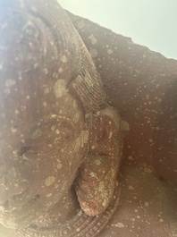 An Indian yellow-speckled red sandstone relief of a devata, probably Mathura school, Kushan period 2nd C. b.C./2nd C.