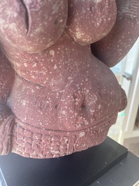 An Indian yellow-speckled red sandstone relief of a devata, probably Mathura school, Kushan period 2nd C. b.C./2nd C.