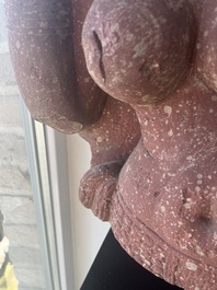 An Indian yellow-speckled red sandstone relief of a devata, probably Mathura school, Kushan period 2nd C. b.C./2nd C.