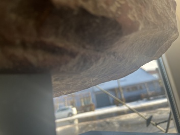 An Indian yellow-speckled red sandstone relief of a devata, probably Mathura school, Kushan period 2nd C. b.C./2nd C.