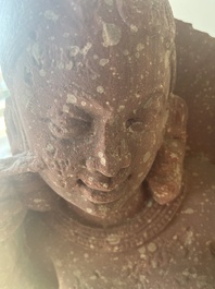 An Indian yellow-speckled red sandstone relief of a devata, probably Mathura school, Kushan period 2nd C. b.C./2nd C.