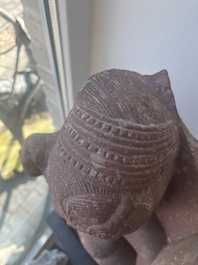 An Indian yellow-speckled red sandstone relief of a devata, probably Mathura school, Kushan period 2nd C. b.C./2nd C.