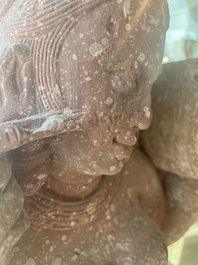 An Indian yellow-speckled red sandstone relief of a devata, probably Mathura school, Kushan period 2nd C. b.C./2nd C.