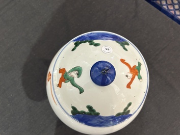 A Chinese wucai 'narrative subject' vase and cover, Wanli mark, 19th C.