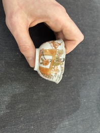 A Chinese iron-red and gilt 'Sanguozhi yanyi' cup and saucer, Yongzheng