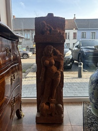 A large Indian red sandstone stupa pillar with a devata shown as a woman and lotus flowers, probably Matura region, ca. 2nd C. b.C - 2nd C.