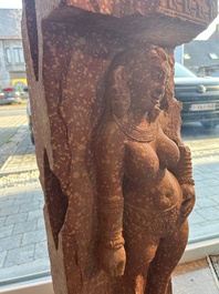 A large Indian red sandstone stupa pillar with a devata shown as a woman and lotus flowers, probably Matura region, ca. 2nd C. b.C - 2nd C.