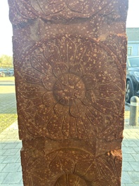 A large Indian red sandstone stupa pillar with a devata shown as a woman and lotus flowers, probably Matura region, ca. 2nd C. b.C - 2nd C.