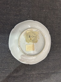 A Chinese iron-red and gilt 'Sanguozhi yanyi' cup and saucer, Yongzheng