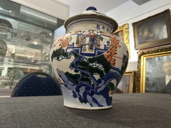 A Chinese wucai 'narrative subject' vase and cover, Wanli mark, 19th C.