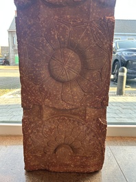 A large Indian red sandstone stupa pillar with a devata shown as a woman and lotus flowers, probably Matura region, ca. 2nd C. b.C - 2nd C.