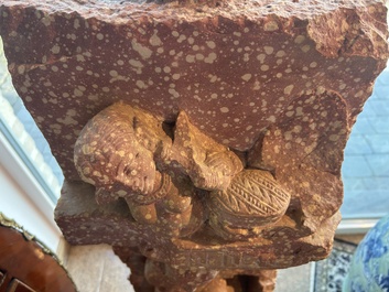 A large Indian red sandstone stupa pillar with a devata shown as a woman and lotus flowers, probably Matura region, ca. 2nd C. b.C - 2nd C.
