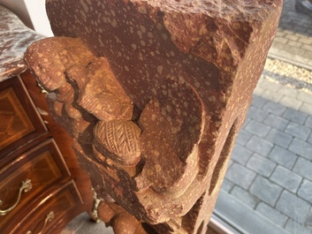 A large Indian red sandstone stupa pillar with a devata shown as a woman and lotus flowers, probably Matura region, ca. 2nd C. b.C - 2nd C.