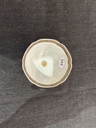 A Chinese iron-red and gilt 'Sanguozhi yanyi' cup and saucer, Yongzheng